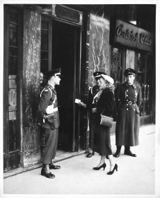 Mrs. J. Harrop before entering the Bristol Hotel